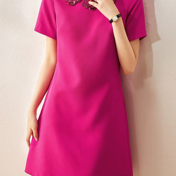 Robe trapèze rose à fleurs