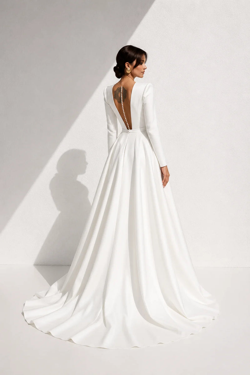 Robe de mariée trapèze manche longue