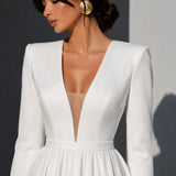 Robe de mariée trapèze manche longue