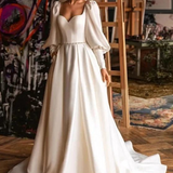 Robe de mariée trapèze manche longue