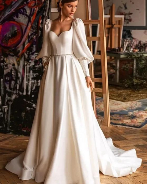 Robe de mariée trapèze manche longue