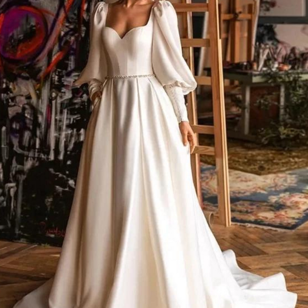 Robe de mariée trapèze manche longue