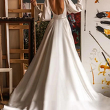 Robe de mariée trapèze manche longue de dos